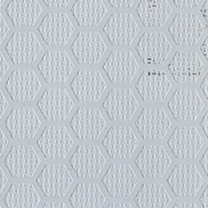 Weißes Sechseck-Fliesenmuster auf einem Brett